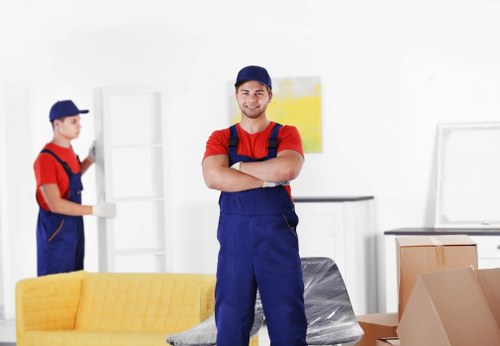 Worker wearing PPE during a Streatham house move