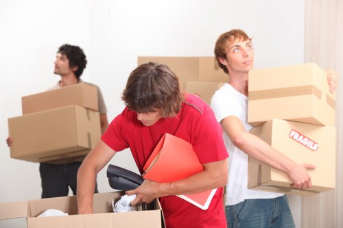 Packed office boxes and labelled items ready for a Streatham relocation