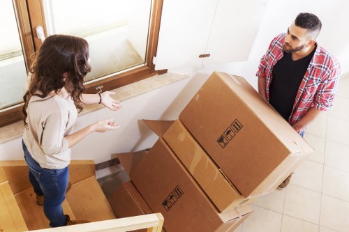 Commercial moving team handling office furniture and equipment in Streatham