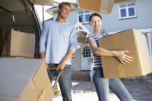Professional piano movers delivering an instrument carefully